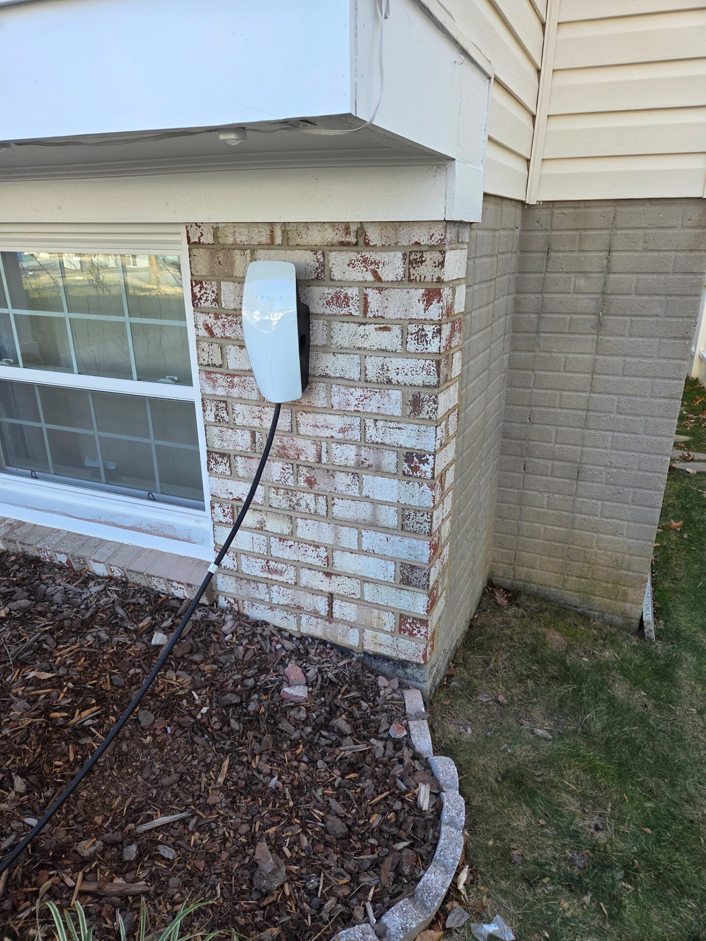 Tesla Wall Connector vs. Universal Level 2 Chargers